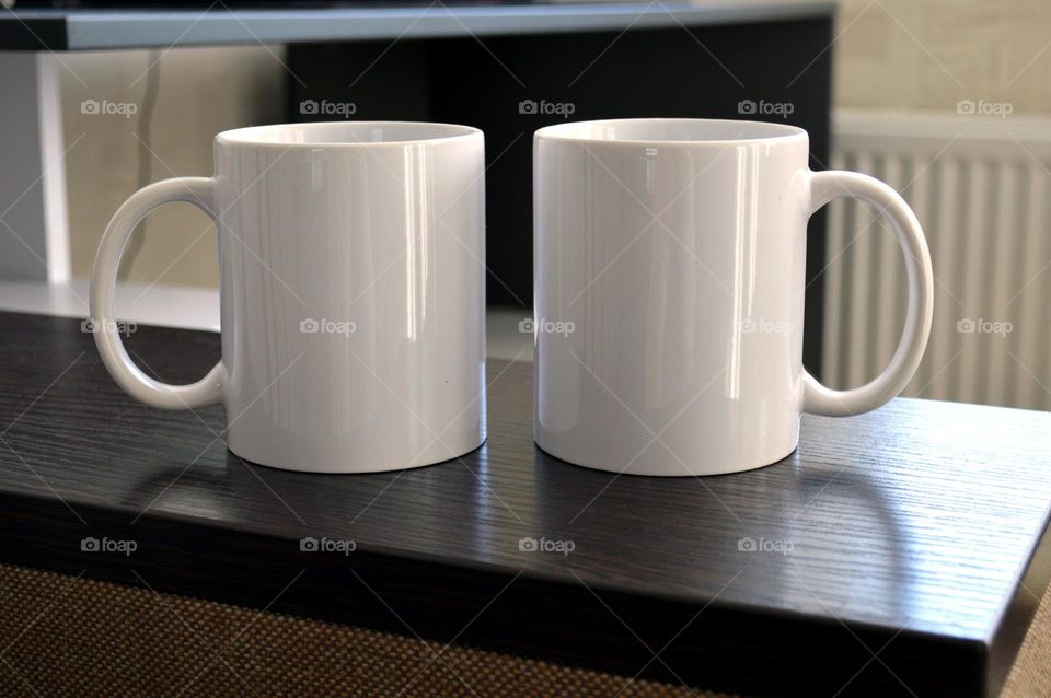 Two white ceramic cups for applying images and photos