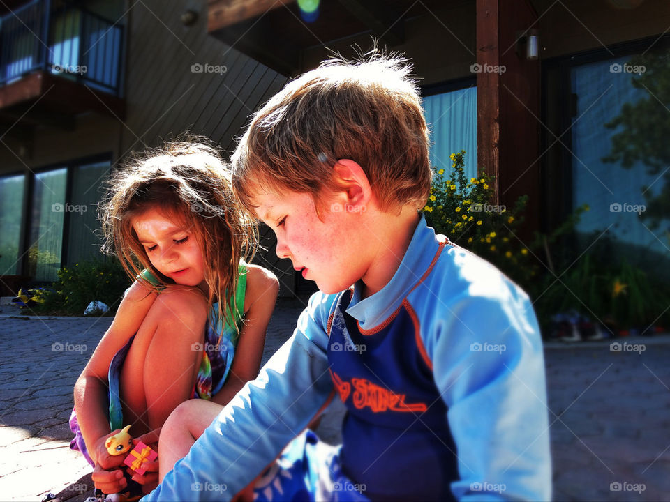 Young boy and girl happy cousins