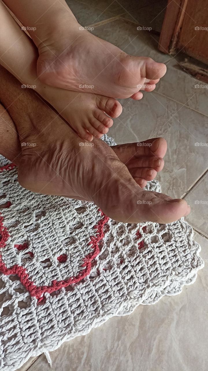 Bare feet in pairs