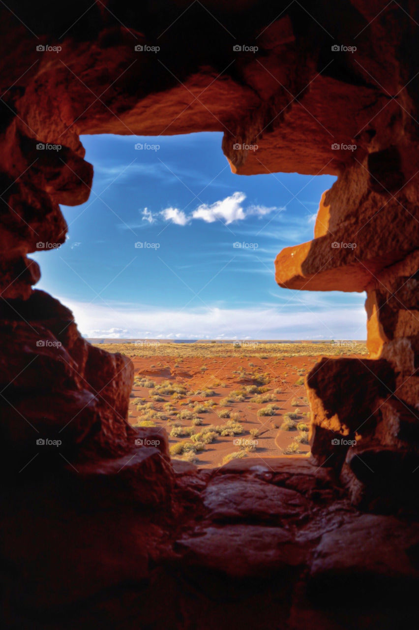 Arizona desert viewed through the window of a pueblo 