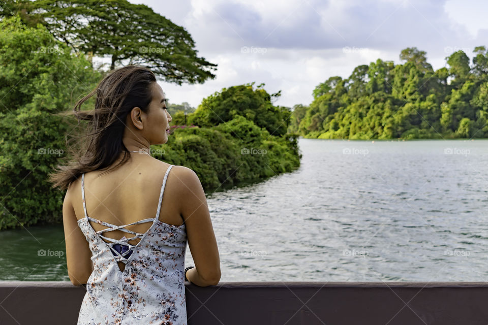 Enjoying the beautiful scenery by the lake