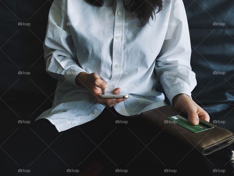 Girl with phone and wallet 