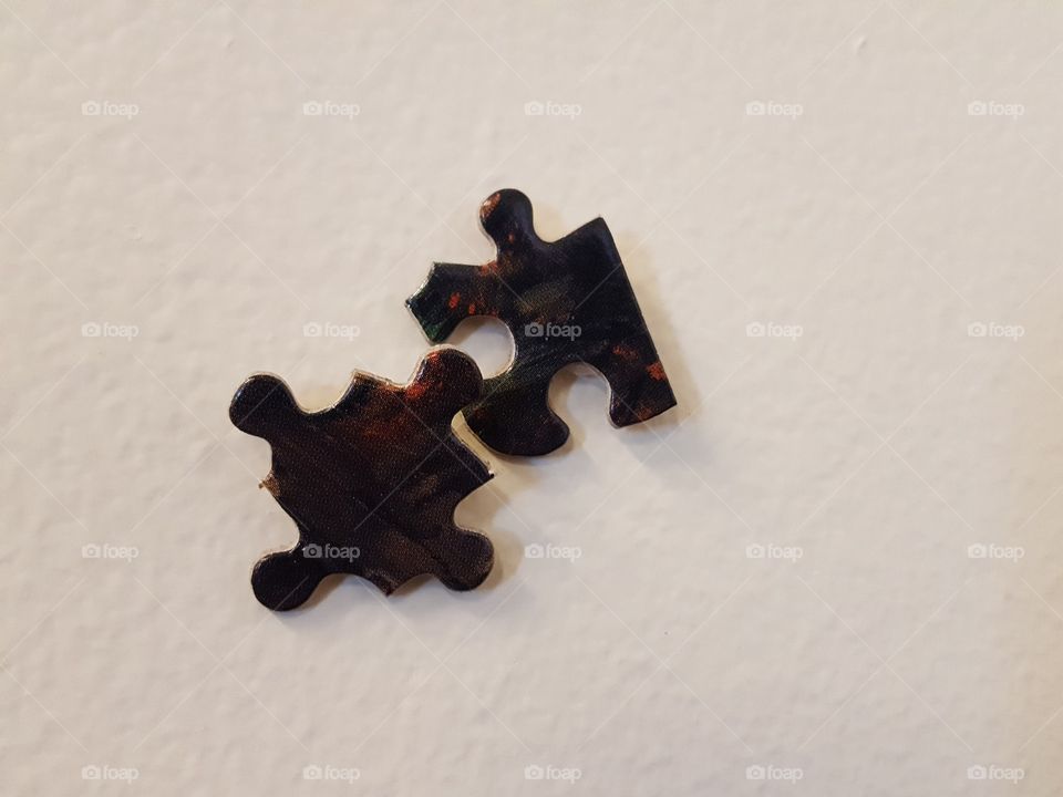 Studio shot of jigsaw puzzle pieces