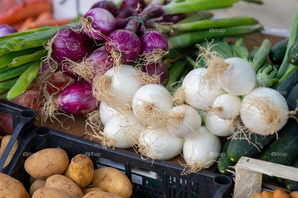 onions on a market stall