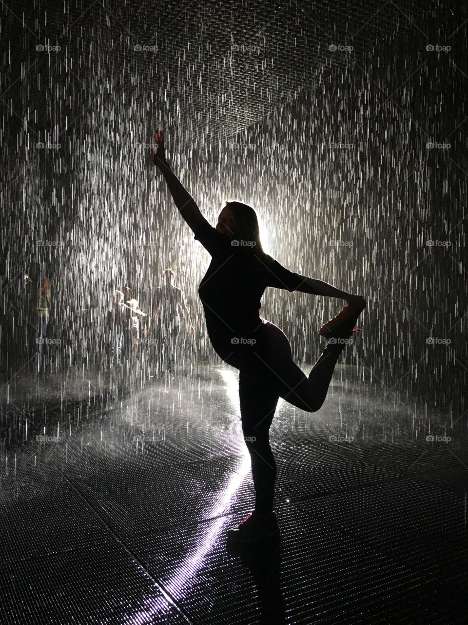 Pregnant fun silhouette in the rain at LACMA