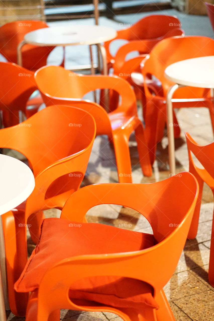 Orange plastic chairs