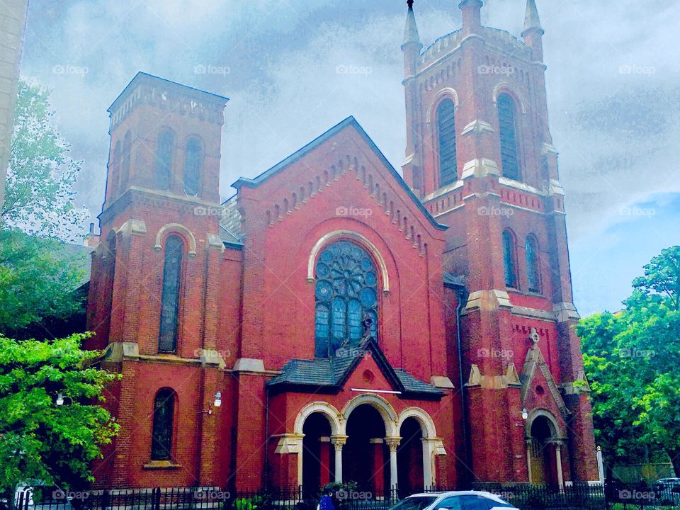 A church in Fort Greene, Brooklyn, New York that resembles stylistically the many brownstone buildings in the area photographed on an overcast autumn afternoon in 2019. Hypnotic Productions
