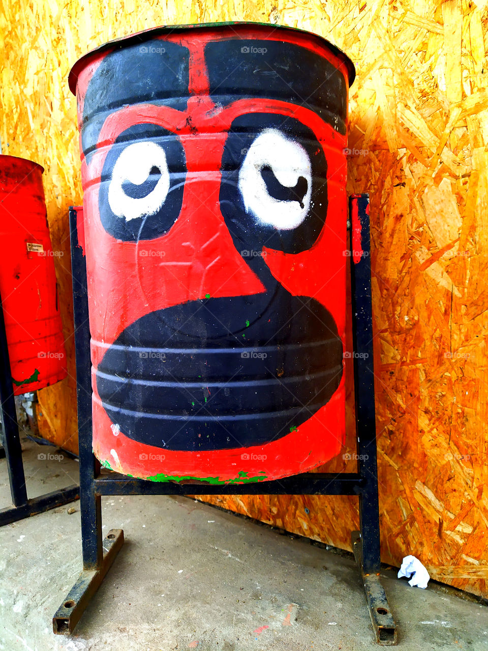 Waste bin.  Graffiti