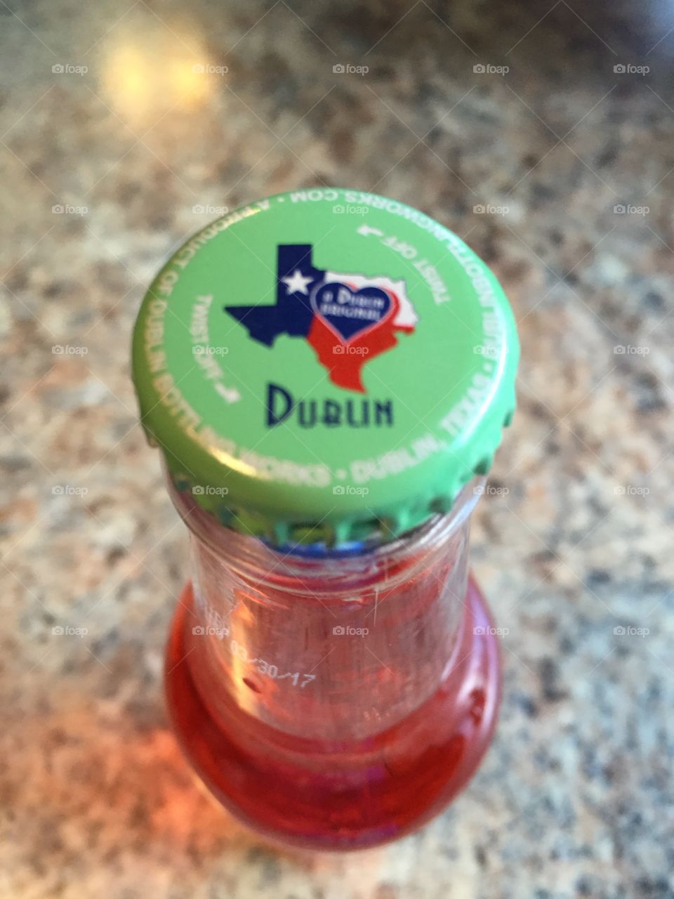 Bottle cap top of my peach flavored soda I got at Burg's Corner in Stonewall, Texas.