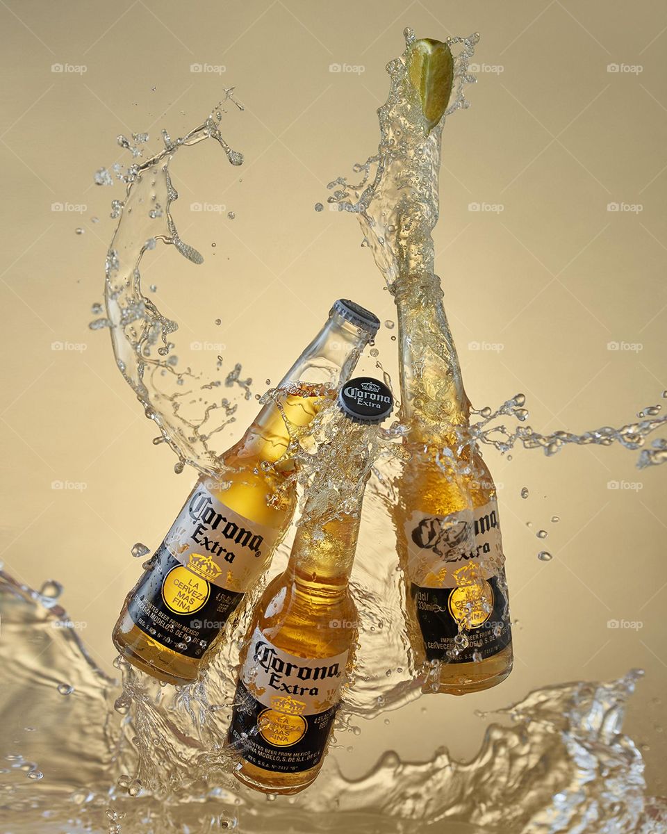 Corona beer bottles with splashes
