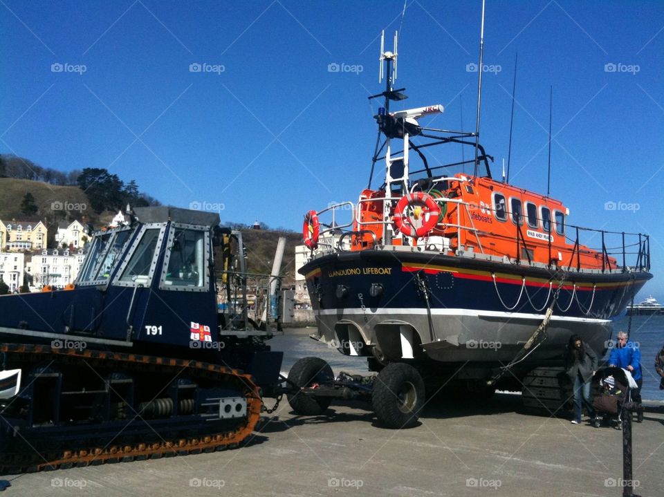 The lifeboat on the shore at Llandudno in North Wales. On standby ready for rescue. 