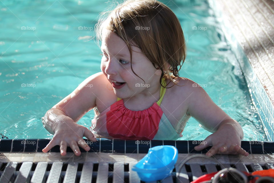 playing in the pool