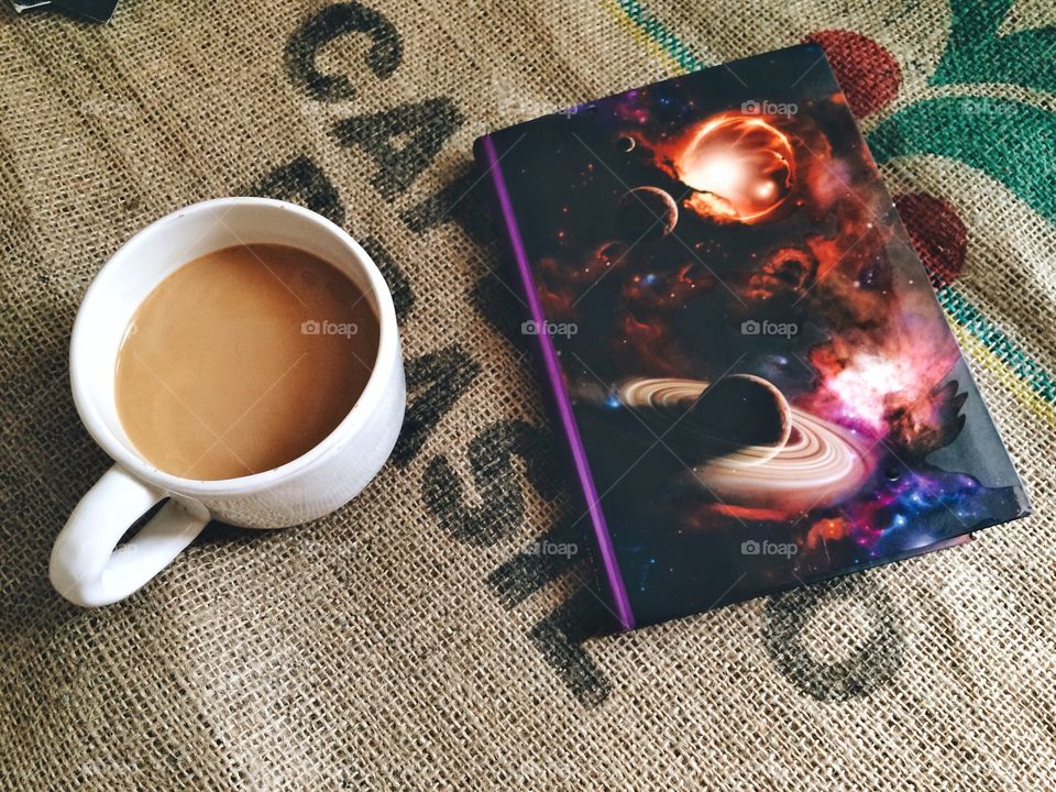 Notebook and coffee