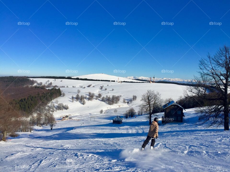 Man skiing alone in the mountains