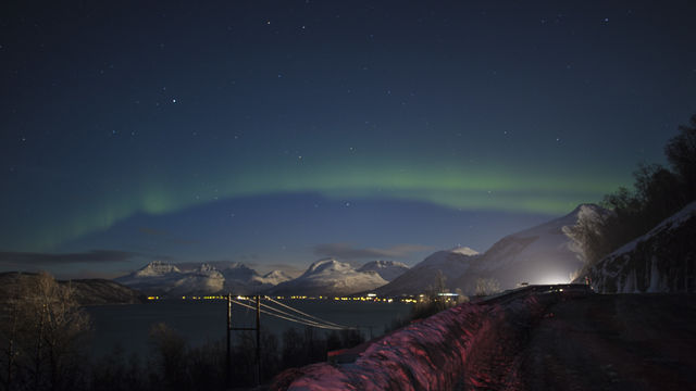 Northern lights in a road near tromso
