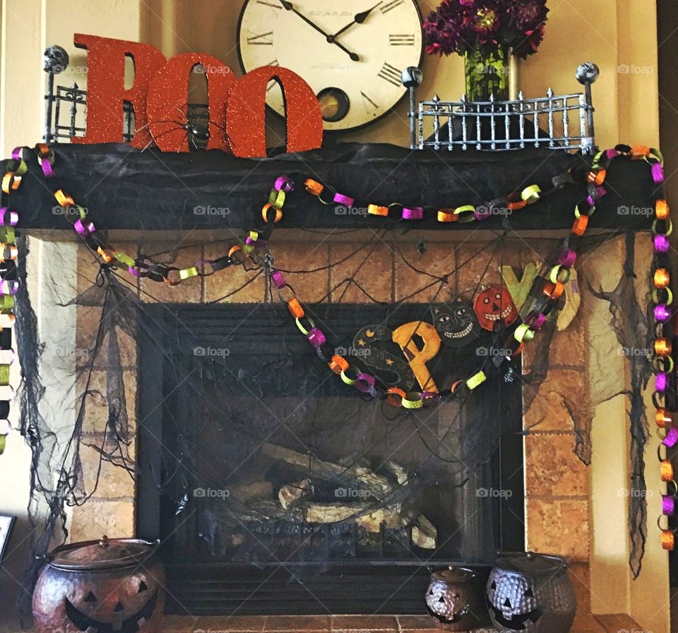 A mantle decorated for Halloween