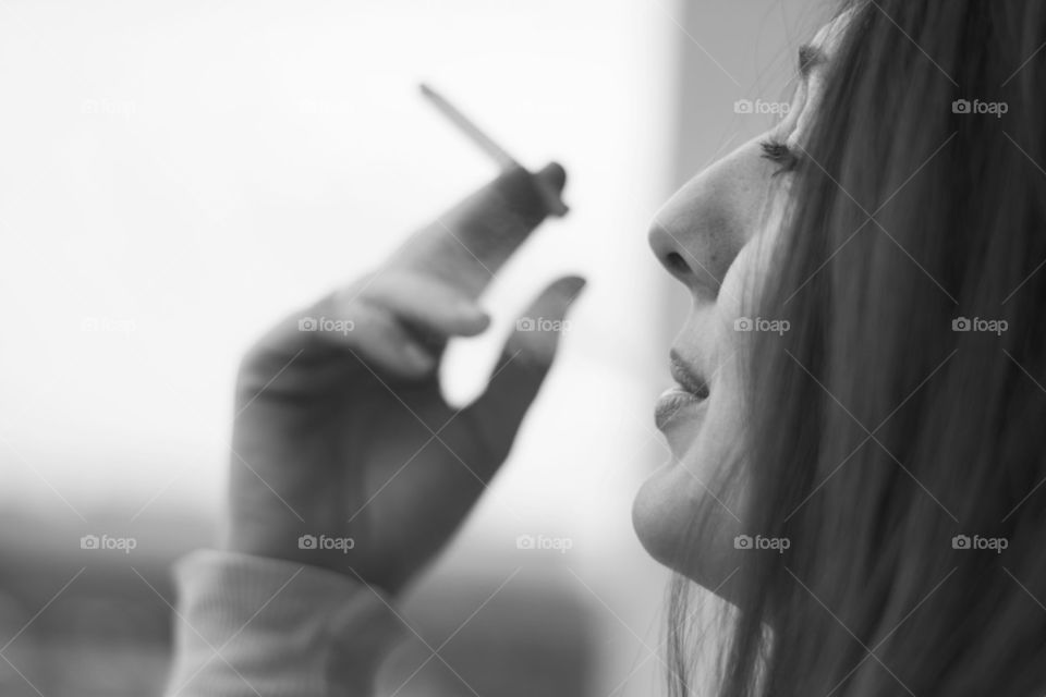 woman enjoying her cigarette