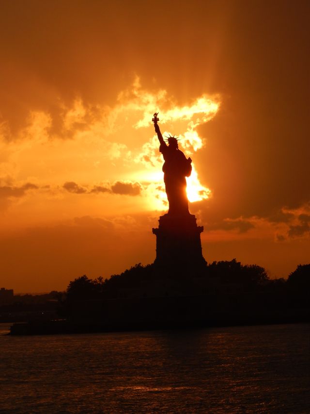 Statue of Liberty at sunset.