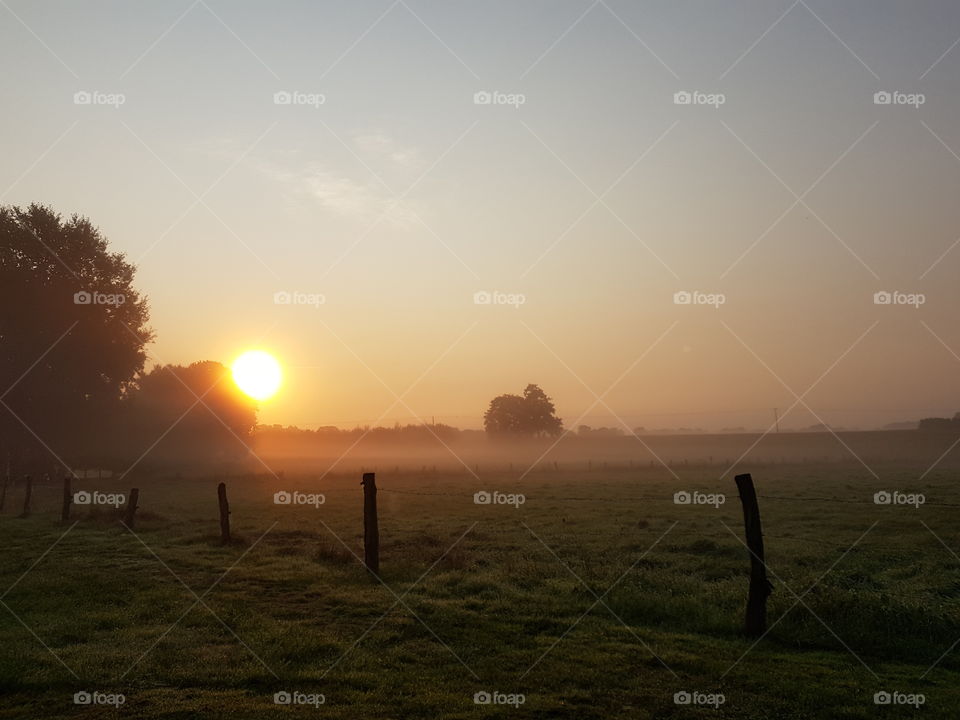 Sunrise on a foggy morning