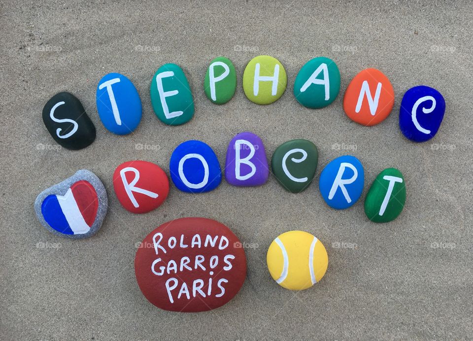 Stephane Robert at Roland Garros, professional tennis player on stones 