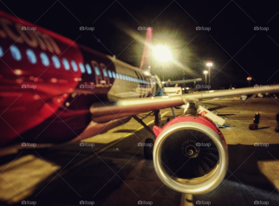 Propeller plane parking at the airport
