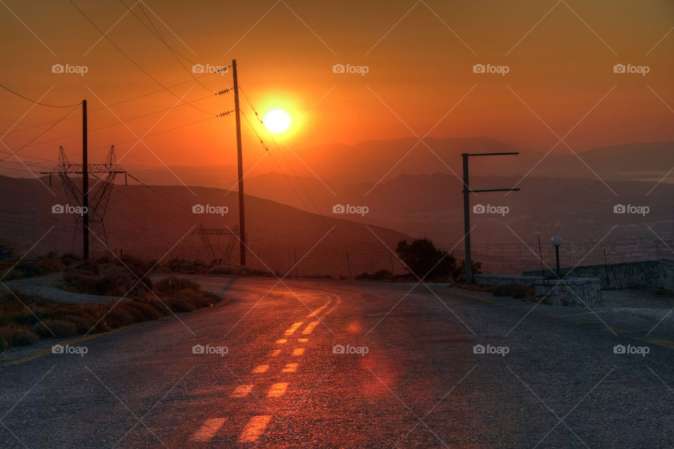malaxa crete light sunset road by chaniaweb