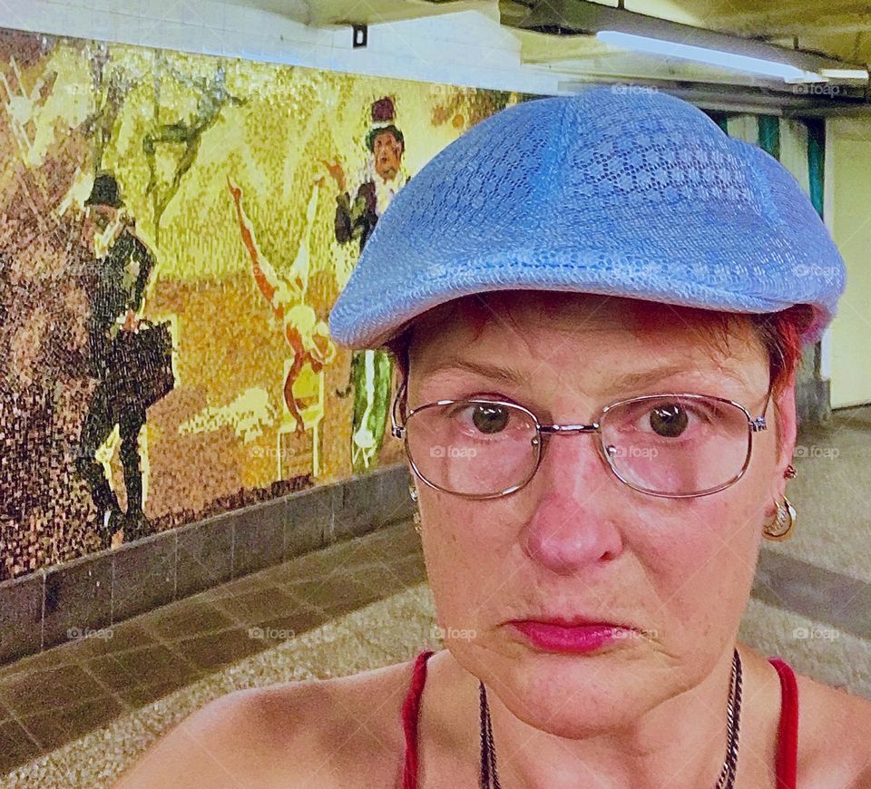 I, „Petra Schiller“ am exploring the „Times Square“ MTA subway station that has been decked out for the occasion with rather interesting artistic mosaic murals depicting scenes from a historical circus perhaps in „Venice“. 2020. Hypnotic Productions