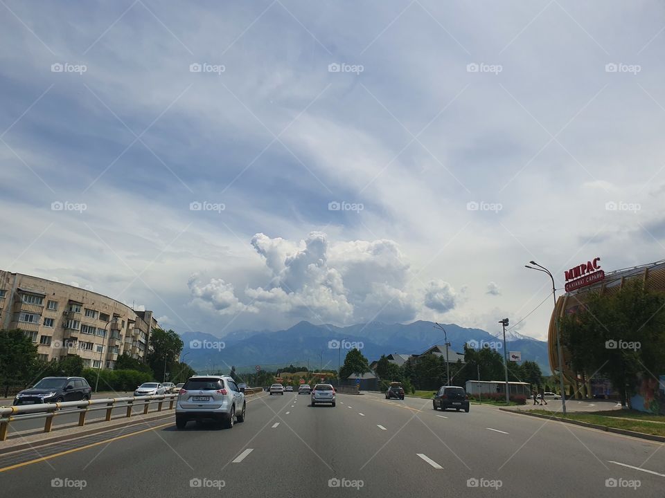 clouds gathering above the mountains
