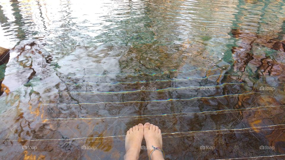 feet under the clear water of Ginnie Springs, Florida