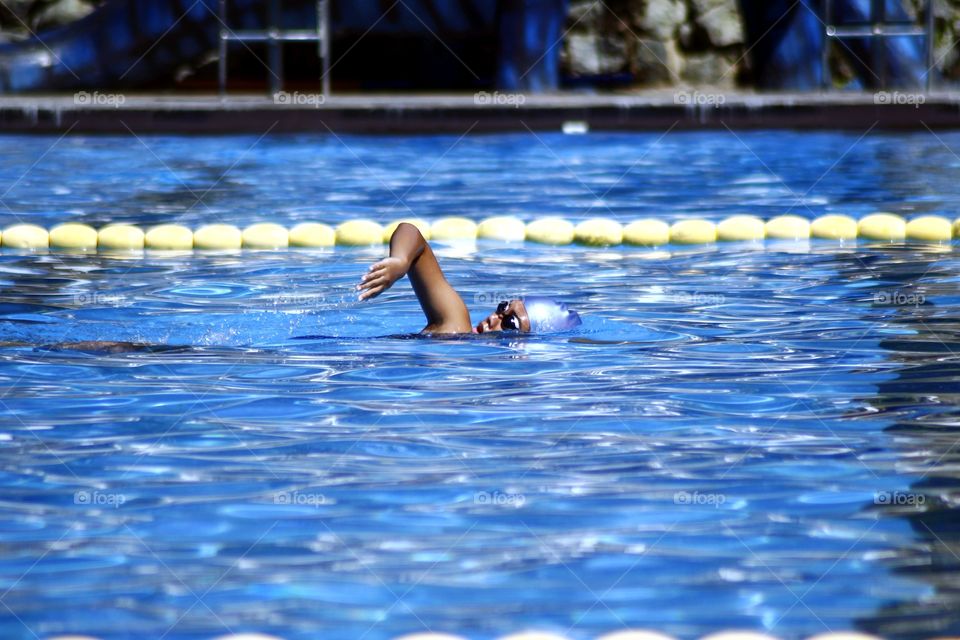 a swimmer in a swimming pool