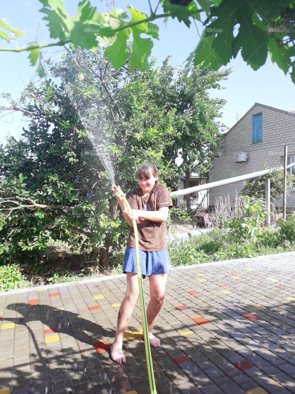 girl playing water