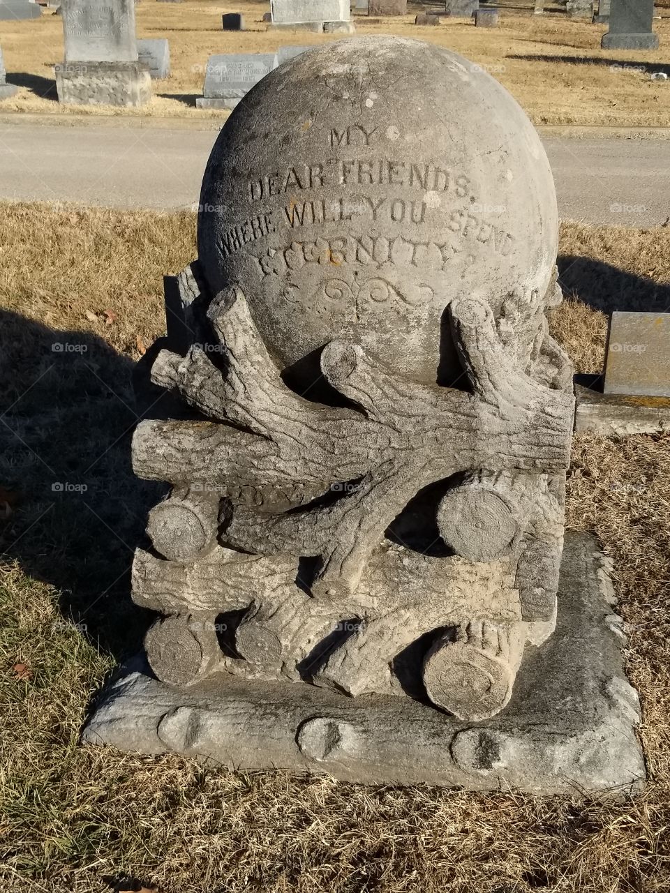 A unique and interesting tomb stone.  Warrensburg Missouri.
"My dear friends where will you spend eternity?"