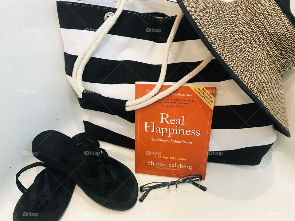 Let’s get ready to travel with best feel good read, sun hat, reading glasses, and favorite sandals for walking in sand! 