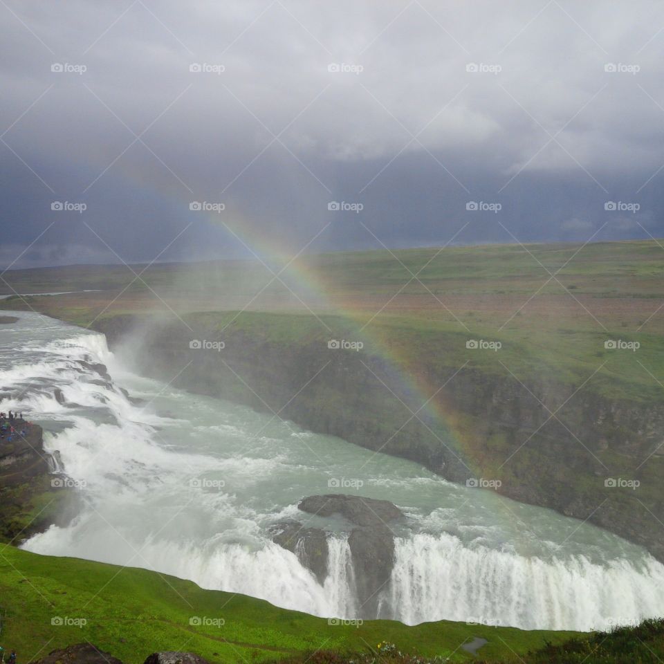 Rainbow over the waterfall