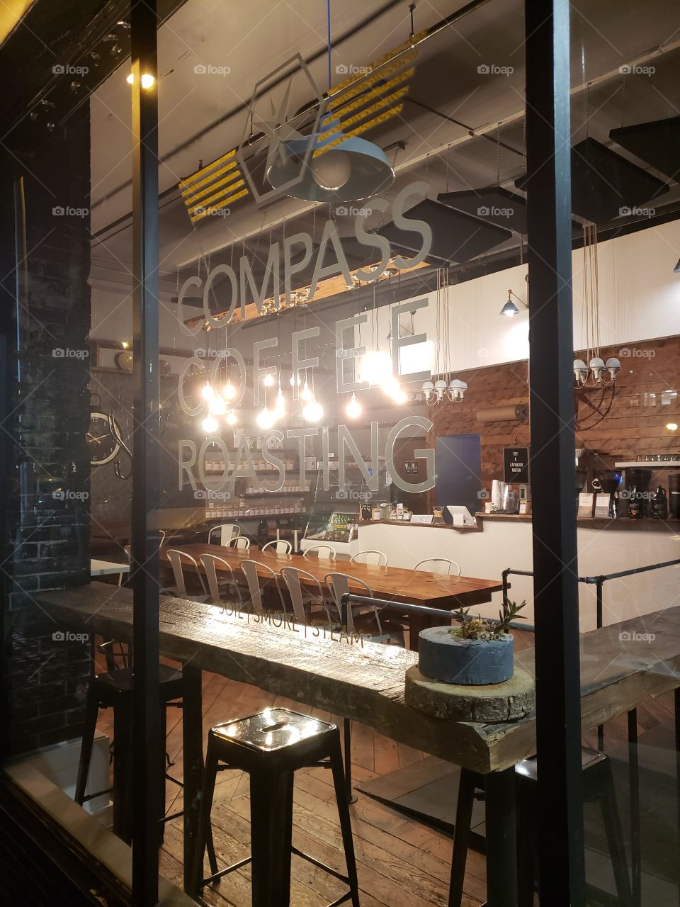 Compass Coffee cafe at nighttime