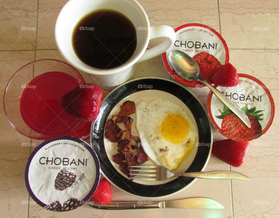 Everything I need for my morning! Eggs, bacon, coffee, juice, and best of all, Chobani!