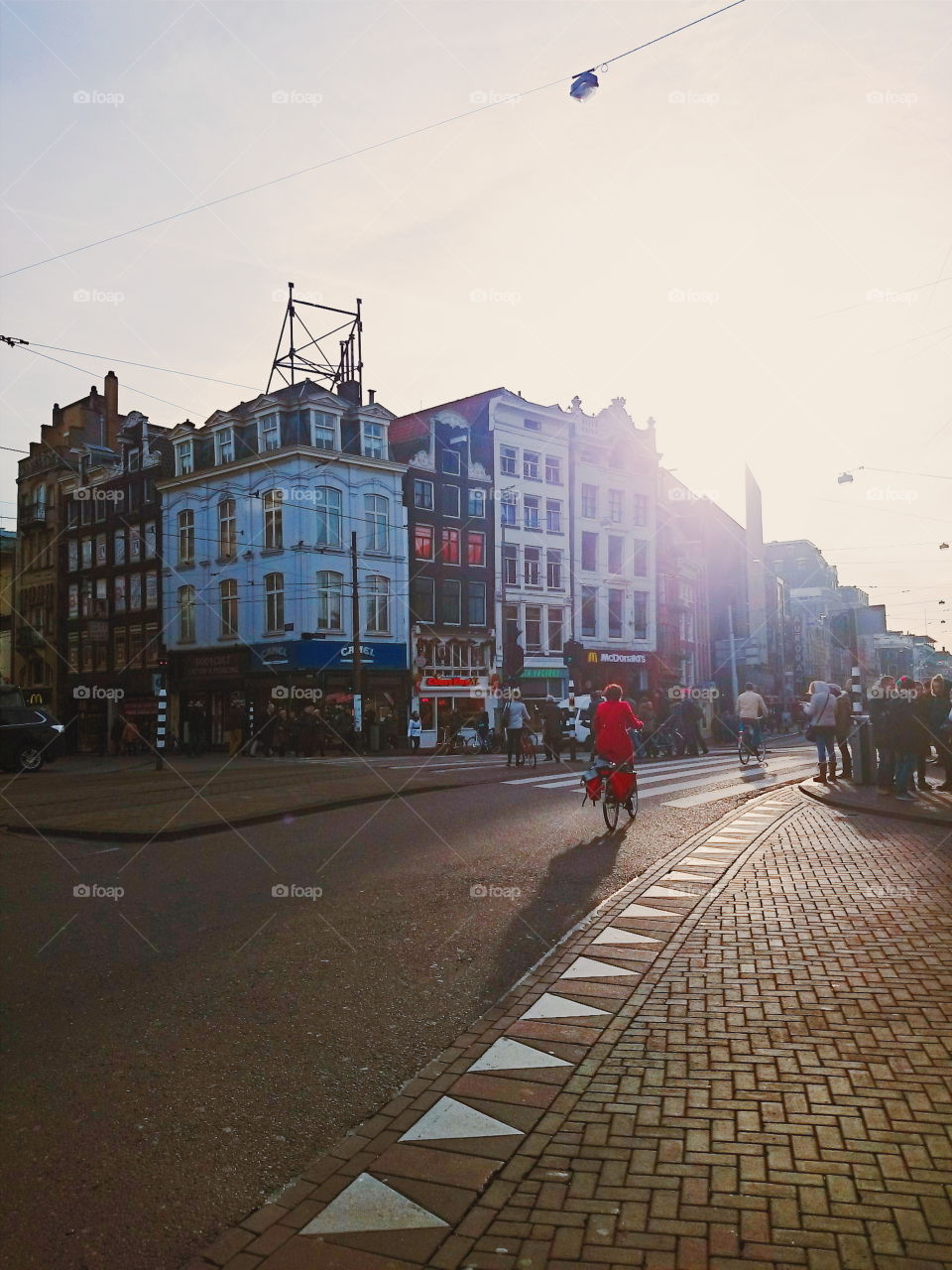 lady in red biking . Amsterdam, the Netherlands - January 2015
