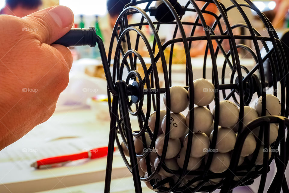 Drawing lottery numbers using a rotavator. This popular game is commonly known as Bingo in Australia.