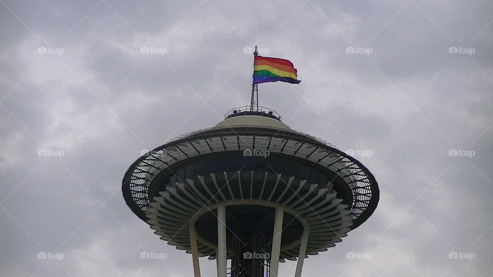 Seattle Gay Pride. Pride flag flying on Space Needle