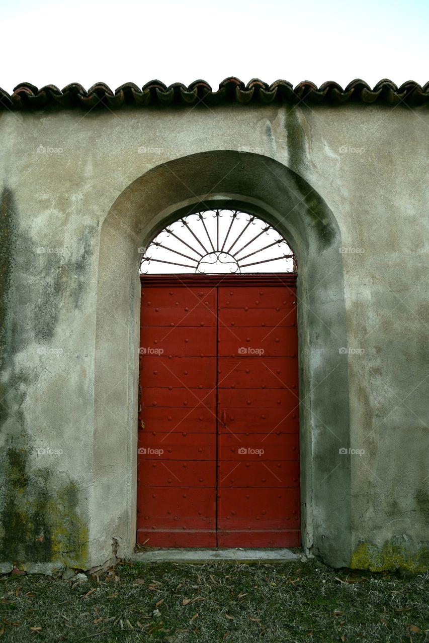 Old red entrance door