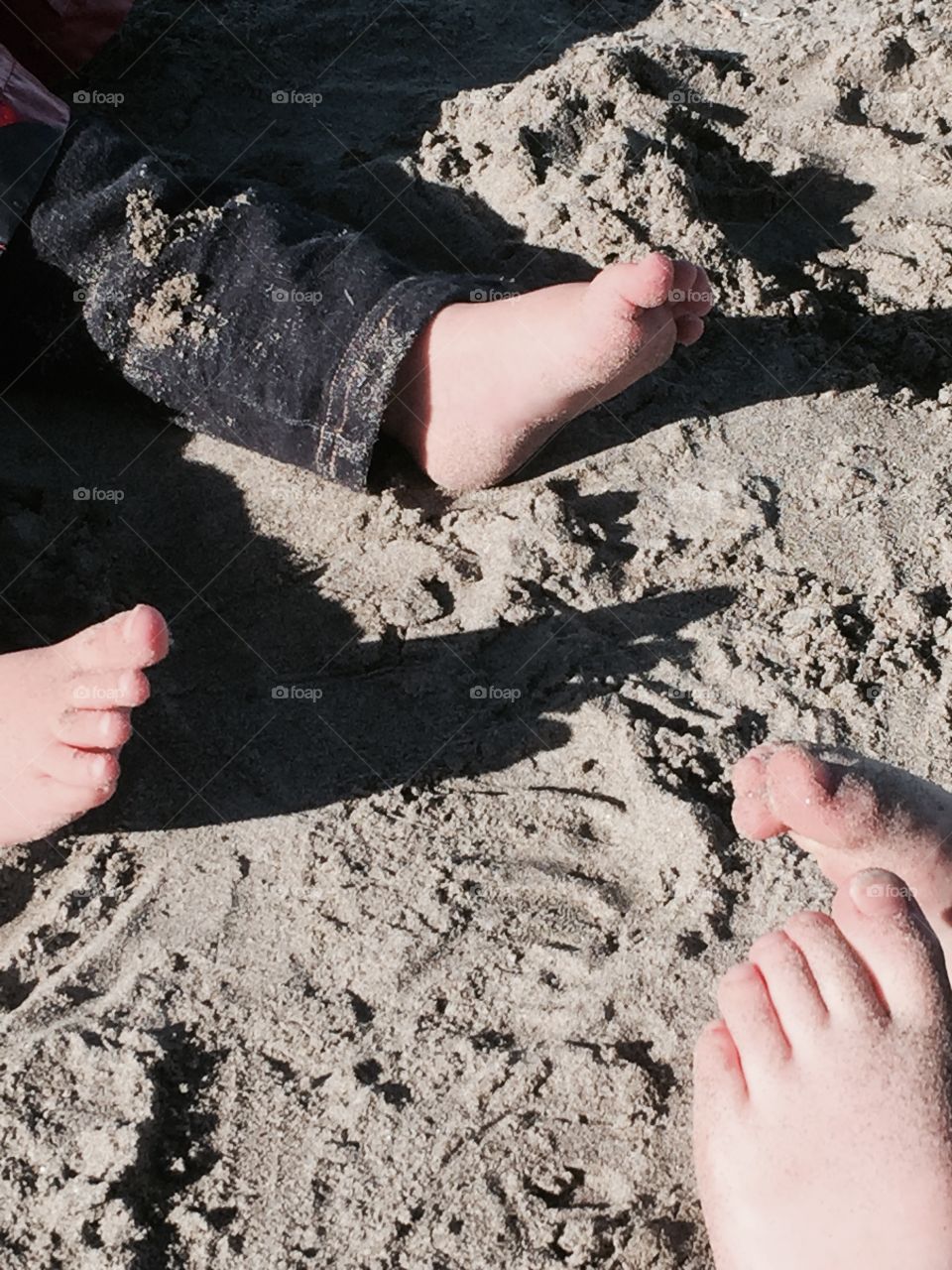 Baby toes in sand