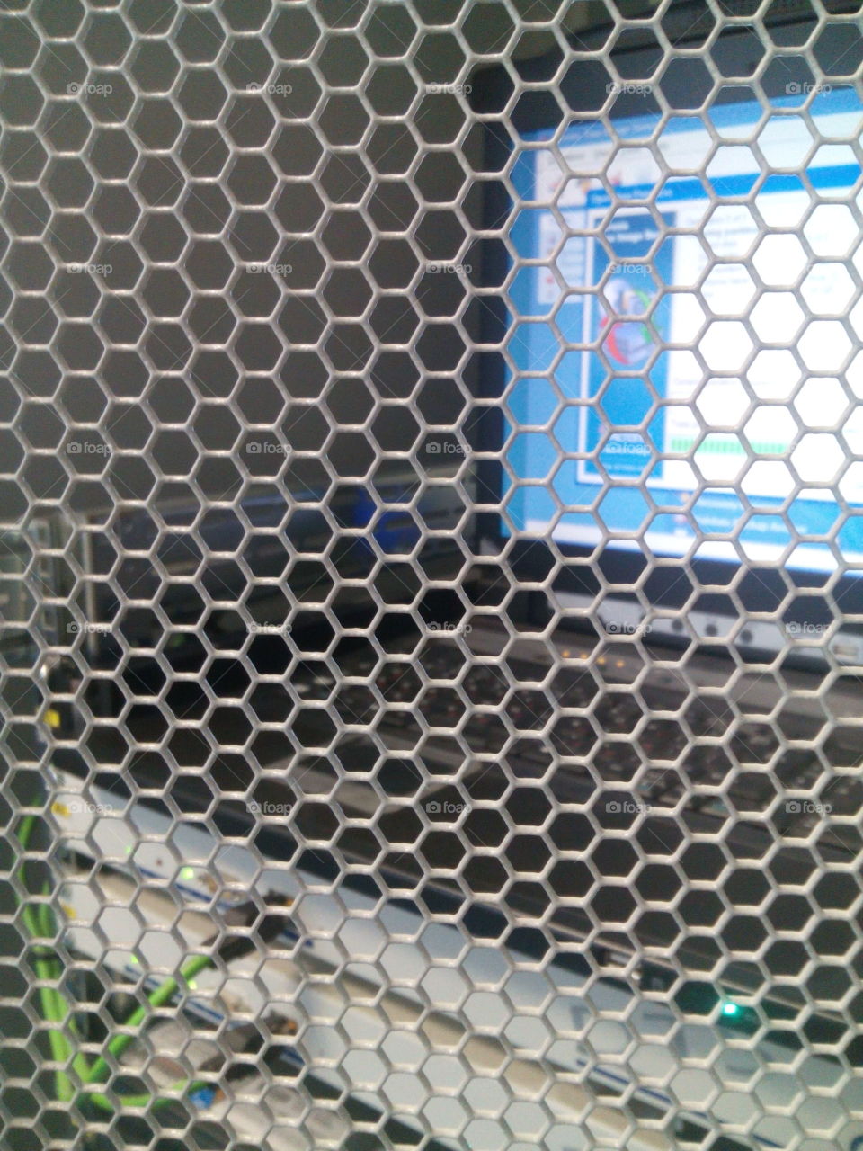 Look through the metal grille in the form of a honeycomb