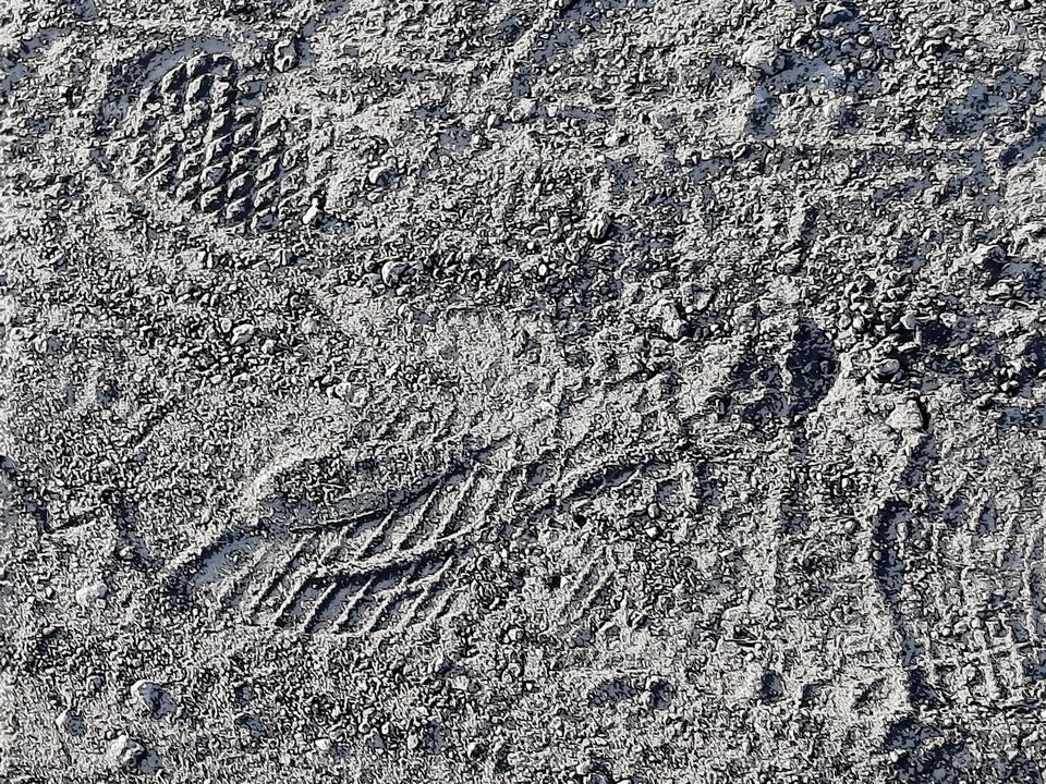 black &white  footsteps on sand