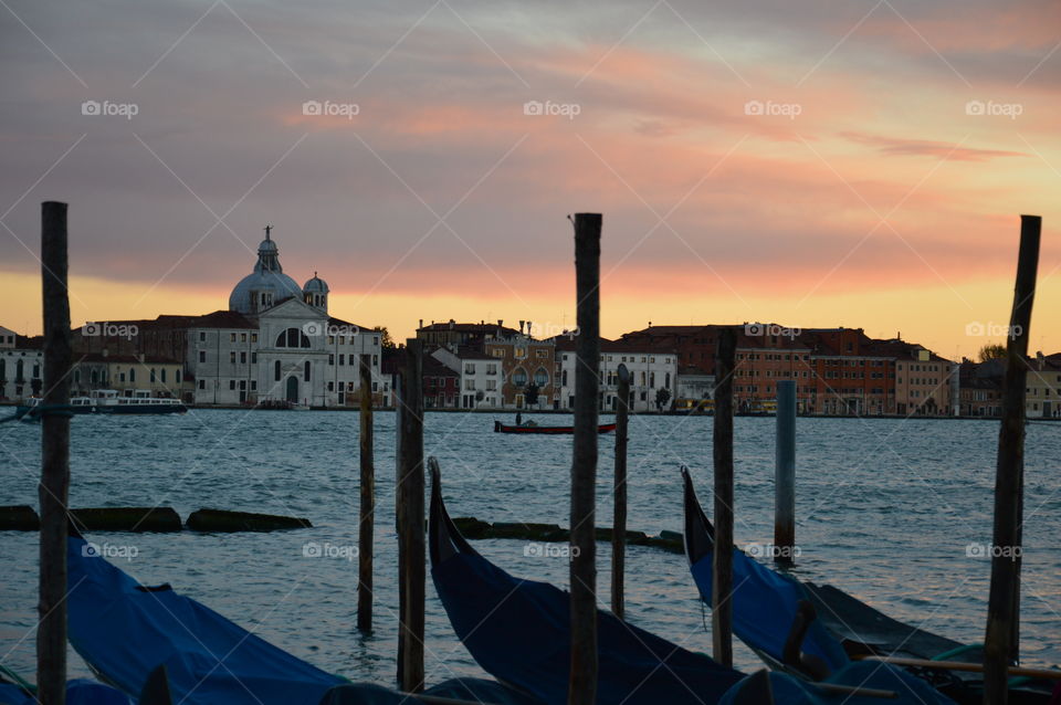 romantic sunset in Venice with curch in the background