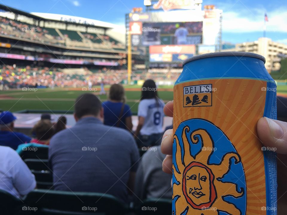 Summertime with baseball and delicious beer. Seats close to the action and a cold beverage. 