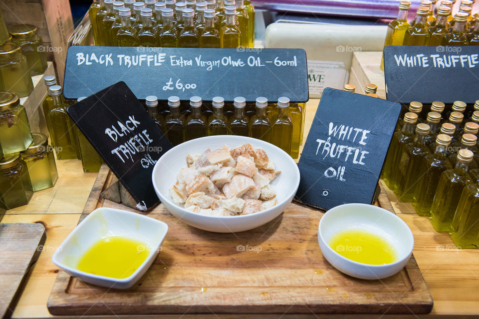 Tastings of exclusive truffle oil, served with a piece of bread at Borough Market in London.