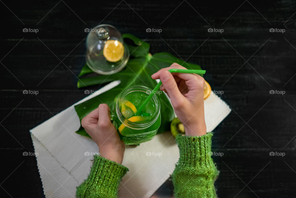 A person making a juice