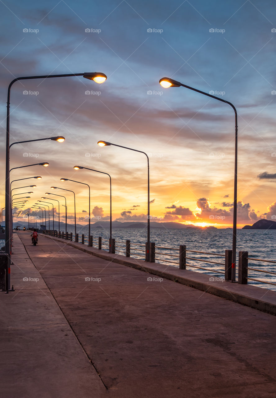 Beautiful twilight scene behind long bridge at Lo Jak port in Koh Yoal Yai Thailand