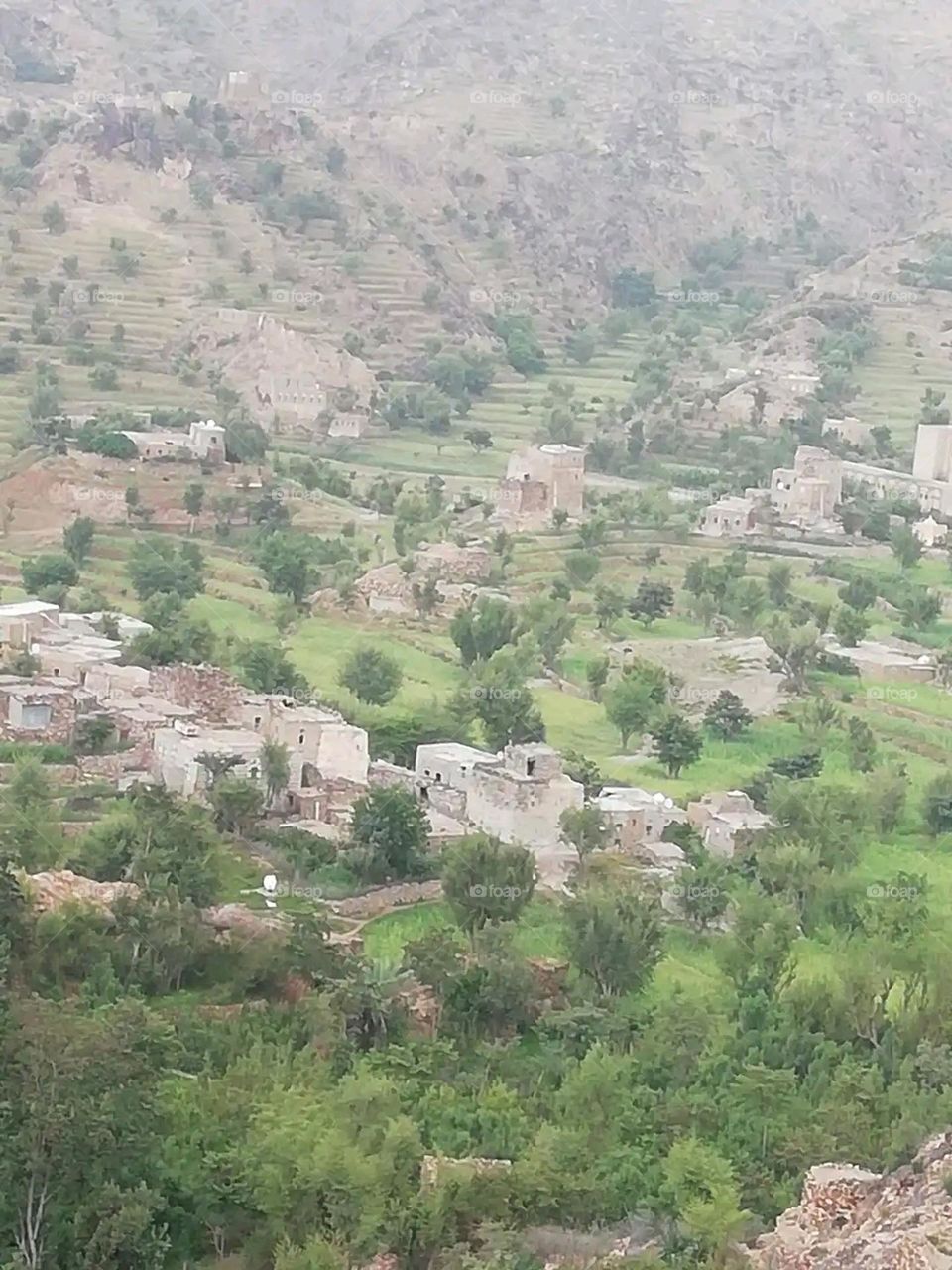 Glory be to God, the magnificent and picturesque view and the natural green trees are a view that is nothing more wonderful than it