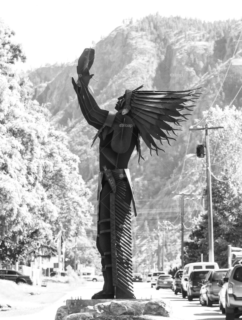 First Nations chief looks up at sky - statue in Canadian park